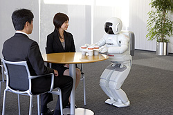 Honda发布新一代ASIMO-把托盘放在桌上